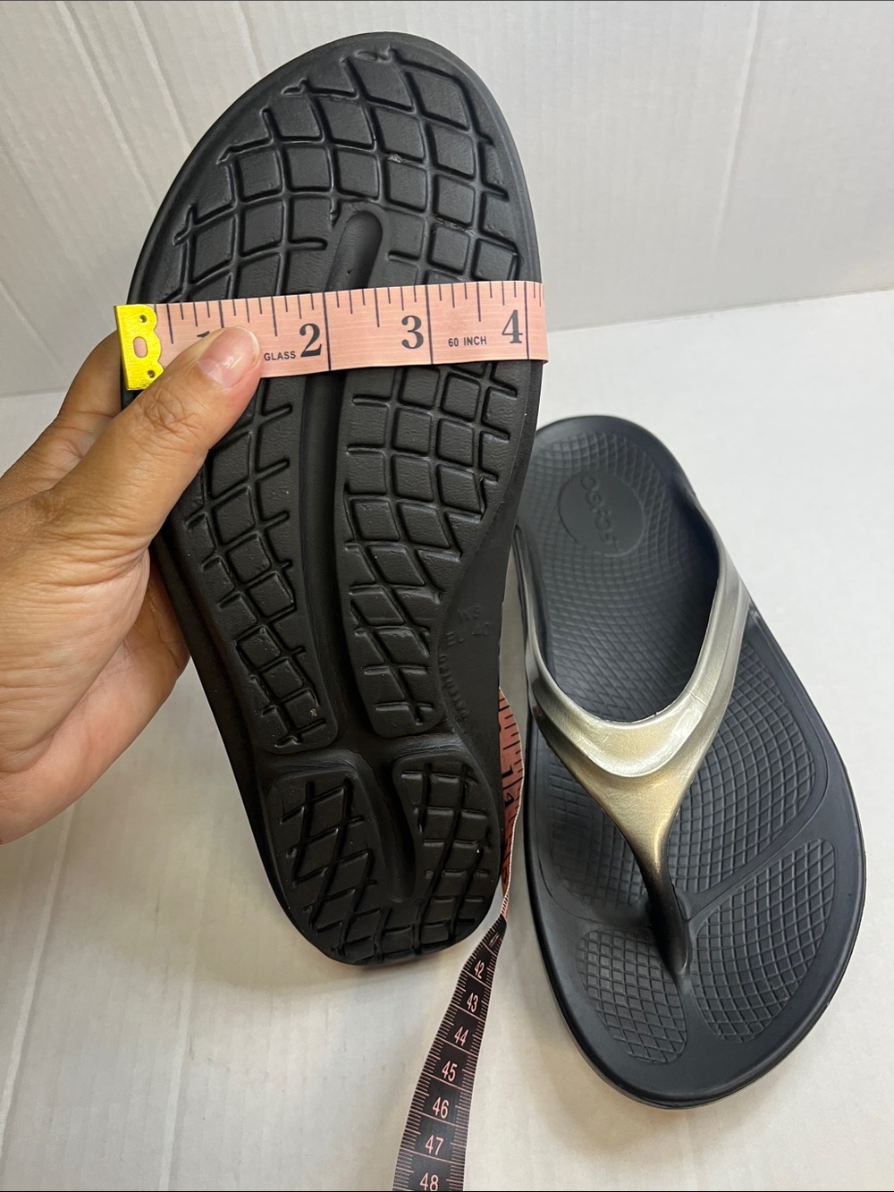 OOFOS Women's Black Flip Flop Sandals with Metallic Silver Straps - Picture 12 of 12